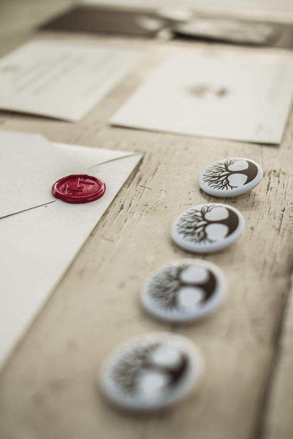 A brand for Tomas and Teresa's wedding. on Behance #wedding #favini crush #pins #logo design #tree #heart #hidden message