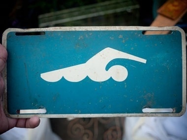 Draplin Design Co.: Junking In Jacksonville #sign #mark #retro #swimmer