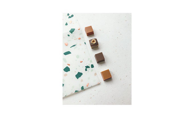 Square Chocolate Packaging Design - Mindsparkle Mag Premium handmade chocolate based in Dubai. The brand design highlight the luxury and sophistication of the product. #logo #identity #branding #design #color #photography #graphic #design #gallery #blog #project #mindsparkle #mag #beautiful #portfolio #designer