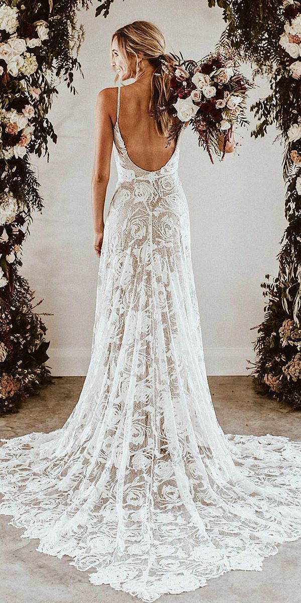 A destination wedding is beautiful! A soft tropical white beach wedding dress, sand, sun and ocean breezes.