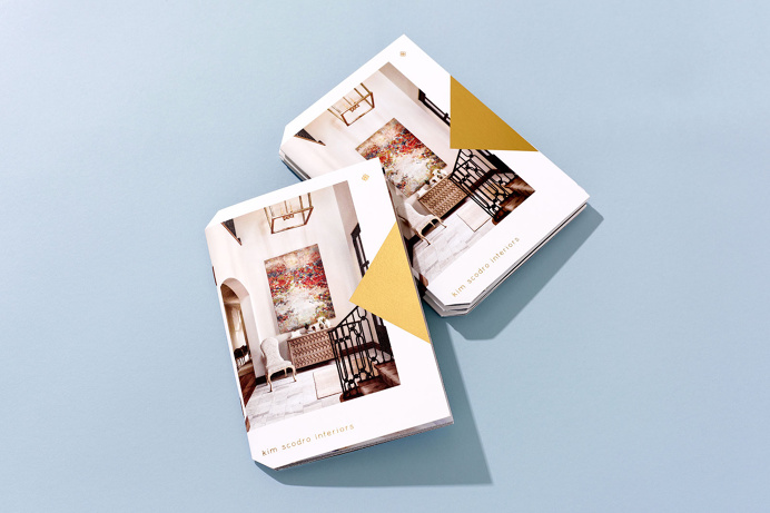 Knoed Creative / 16-page mini brochure with built-in pocket, die cut corners and gold foil stamp. #printdesign #brochure #foilstamp