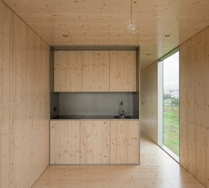 MIMA Light is a minimalist modular house showcased in Viana do Castelo, Portugal, created by MIMA Architects.