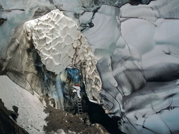 Picture of a climber in an ice cave in Antarctica #antartica #geographic #snow #climber #extreme #sports #ice #national