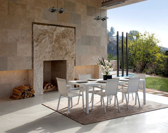 Californian House Encased in Beautiful Travertine Stone - #outdoor, outdoor, #dining, Dining Area, #chairs, #fireplace