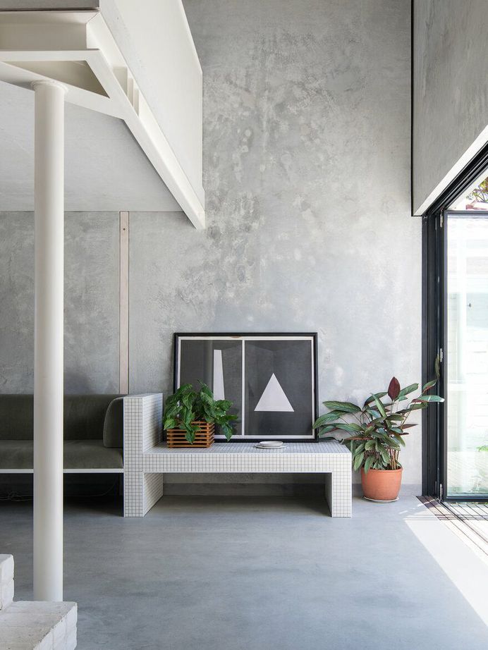 Carbon Neutral House Made from Concrete Panels and Whitewashed Recycled Brick 3