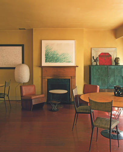 Francesco Clemente's living room features a drawing by #CyTwombly over the fireplace. It's flanked by a #Jean-MichelBasquiat drawing and a p
