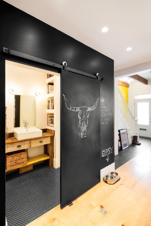 HISTORICAL ROW HOUSE GETS A WHIMSICAL, INDUSTRIAL RENOVATION