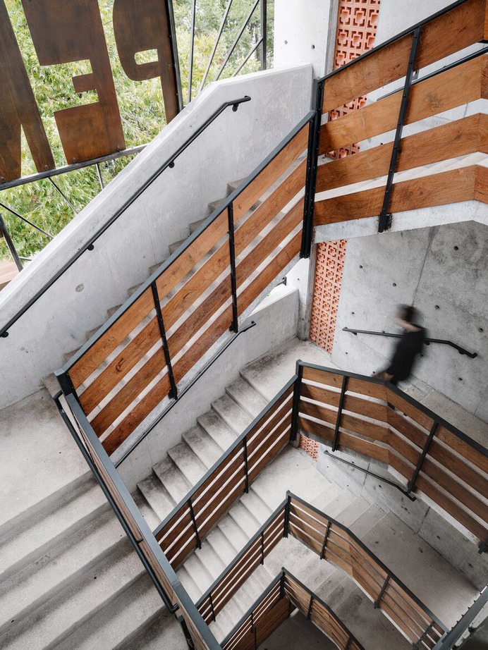 mid-century-utilitarian" carpenters' union hall building convert into hotel near downtown Austin