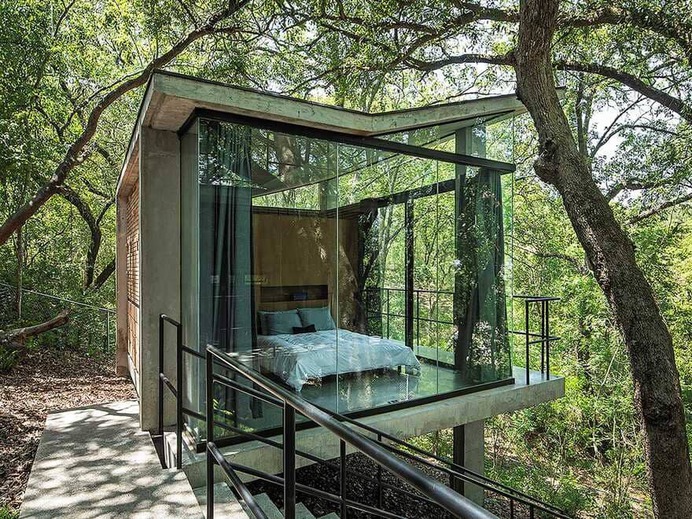 Modern Forest House Consisting of Small Pavilions Connected by External Walkways