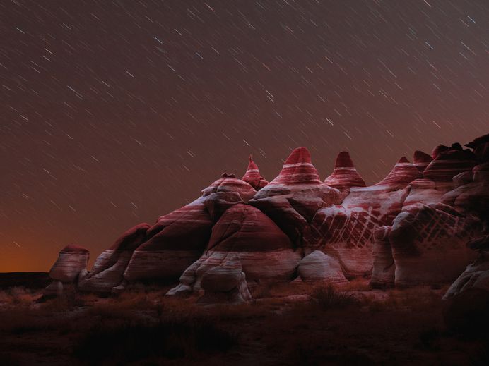 Long Exposure Photos Capture the Light Paths of Drones Above Mountainous Landscapes | Colossal