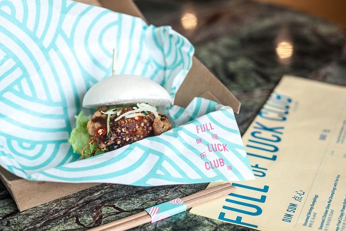 Branding, menu and fast food packaging by Bravo for modern Cantonese kitchen Full of Luck Club 福乐