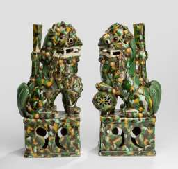 Pair of 'Sancai'-glazed incense holders in the Form of a Buddhist guardian lions #Sets #Tea sets #Porcelain sets #Antique plates #Plates #Wall plates #Figures #Porcelain figurines #porcelain