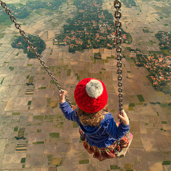 Surreal Photo Manipulations by Caras Ionut #aerial #photo #child #earth #photography #manipulation #swing