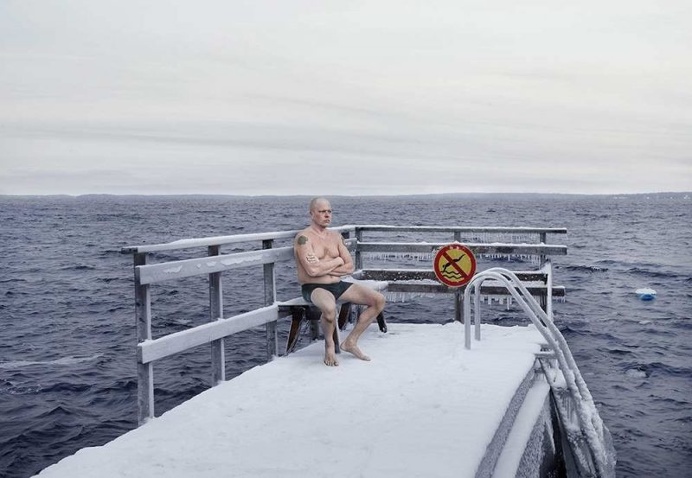 Winter Swimming in The Frozen Lake by Markku Lahdesmaki