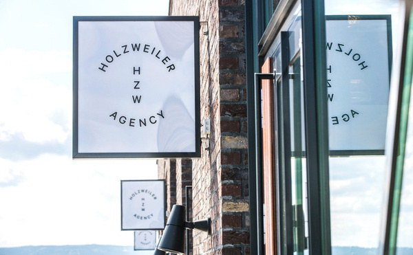 Logo and exterior signage designed by Bielke+Yang for contemporary fashion distributor Holzweiler #typography