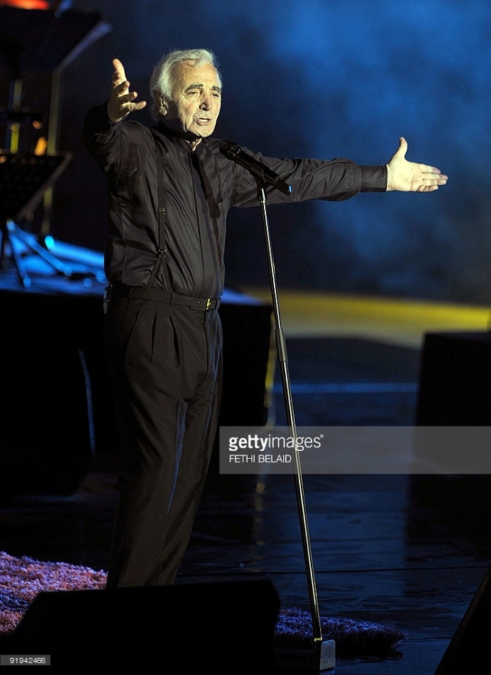French singer Charles Aznavour performs during the 45th International Carthage festival, on July 21, 2009 at the Romain theatre in Carthage,
