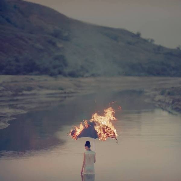 New Surreal Portraits from Oleg OpriscoNovember 15 #surrealism #photography #umbrella #fire