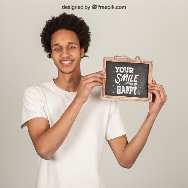 Happy man showing slate Free Psd. See more inspiration related to Mockup, Template, Man, Quote, Face, Smile, Happy, Presentation, Chalkboard, Mock up, Boy, Chalk, Drawing, Young, Up, Happy face, Guy, Holding, Showcase, Stylish, Slate, Smiling, Mock, Joyful, Presenting and Showing on Freepik.