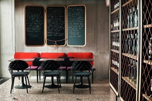 A Cocktail Bar That Evokes The 1960s Jet Set | Co.Design: business + innovation + design #interior #red #chairs #industrials #1960s