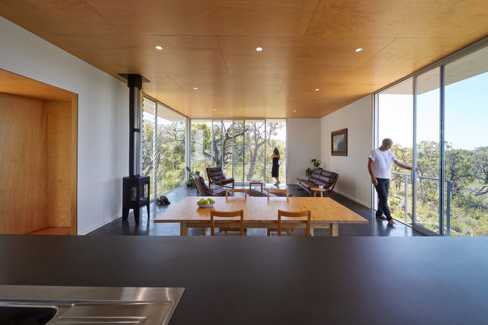 Wilderness House is a Elevated Platform with Large Areas of Glass