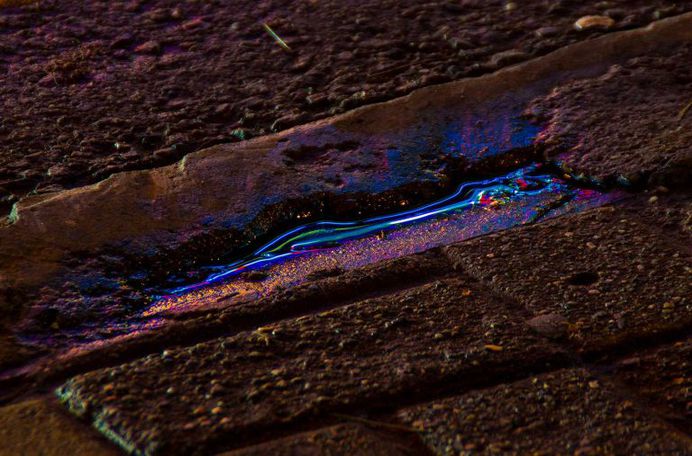 Wet Neon: Magical Reflections In Street Puddles by Slava Semeniuta