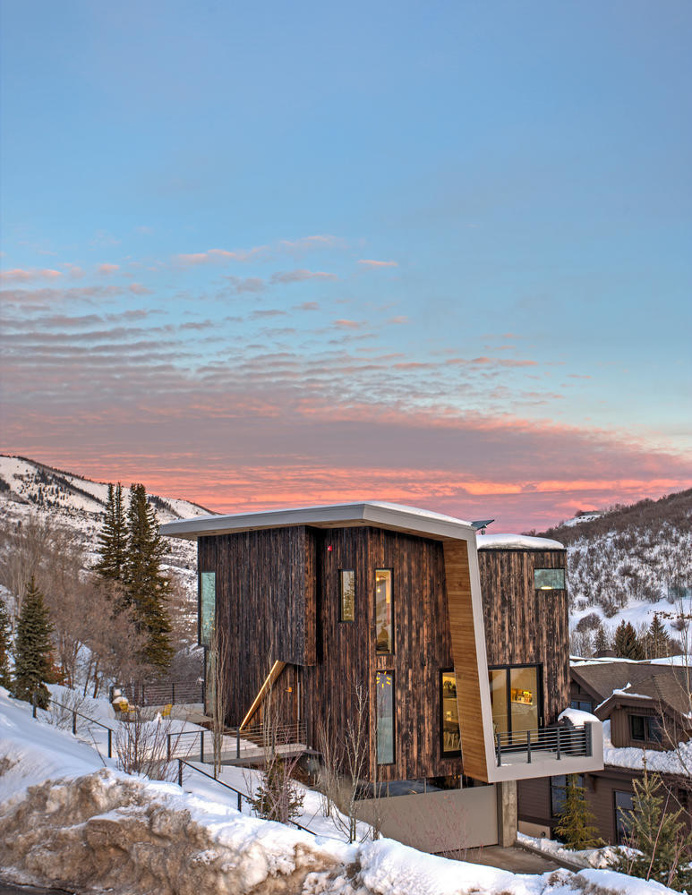 The residence is sited to maximize sunset views. The location, just outside of the historic district, allowed the homeowners to stay close t