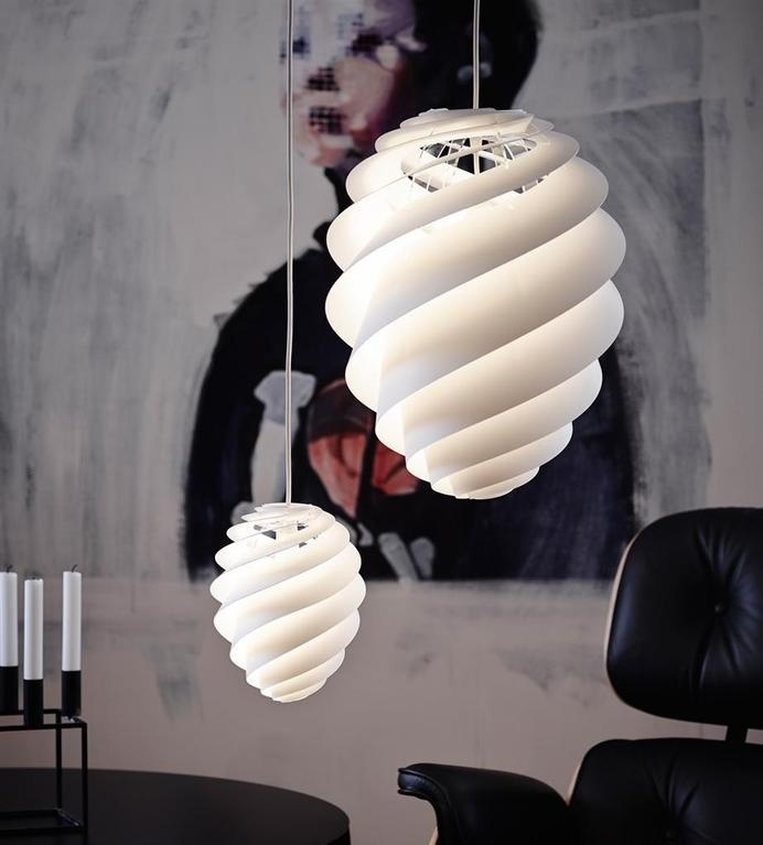 Swirl lamp light and delicately by Le Klint / www.homeworlddesign.com #lamp #lighting
