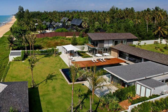 Villa Summer Estate is a newly built modern & luxurious holiday house on absolute beachfront in Natai Beach, Phuket. Features a 25m pool, gym, fully-equipped kitchen, AC, BBQ, daily breakfast, maid service, personal chef & modern amenities. Book Exclusively with Villa Getaways!