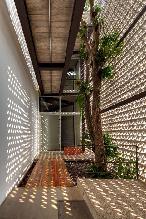 Perforated concrete walls encase La Tallera gallery by Frida Escobedo