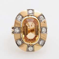 Ladies ring. bes. 1 Imperial Topaz CA. 4,97 ct and 8 Diamit-Brill.