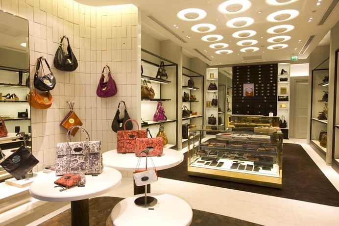 Internal shot from in store of the various different retail displays used to display and present the handbags from premium brand Mulberry.