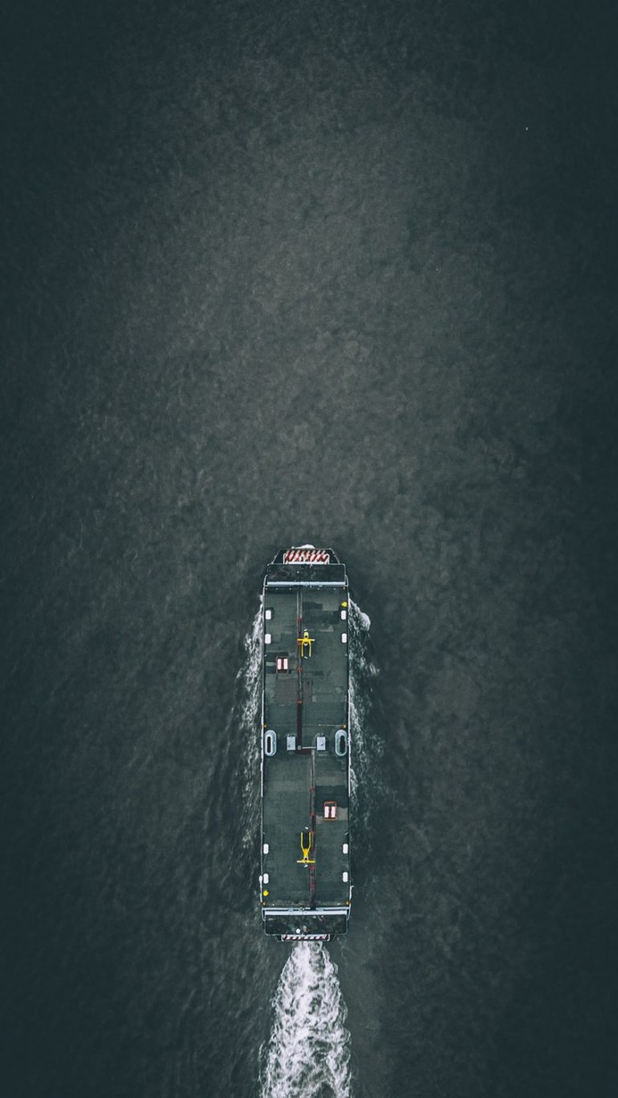 Top view of a boat photo by Izuddin Helmi Adnan