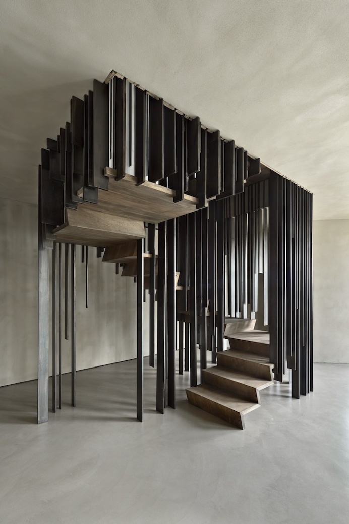 Staircase by storage associati
