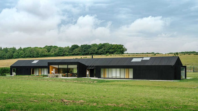 A Contemporary Hampshire Barn Set within a Landscape of Fields and Woods