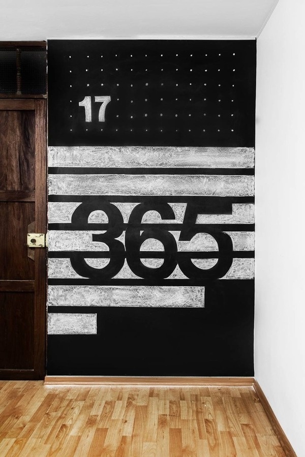 helvetica typography on chalkboard #interior #lettering #17 #365 #interiordesign #blackwall #chalkboard #wall #swissdesign #hoffman #linotype #helvetica #bauhaus #typography