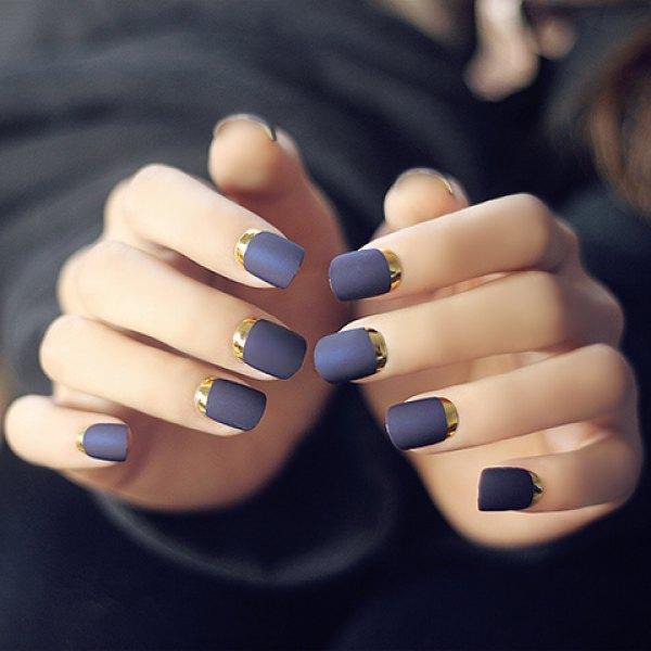 Deep purple matte nail polish for the base and some metallic gold under. It's a perfect match to keep everything simple and yet elegant. The metallic gold gives the look a little "kick" just to make it playful.