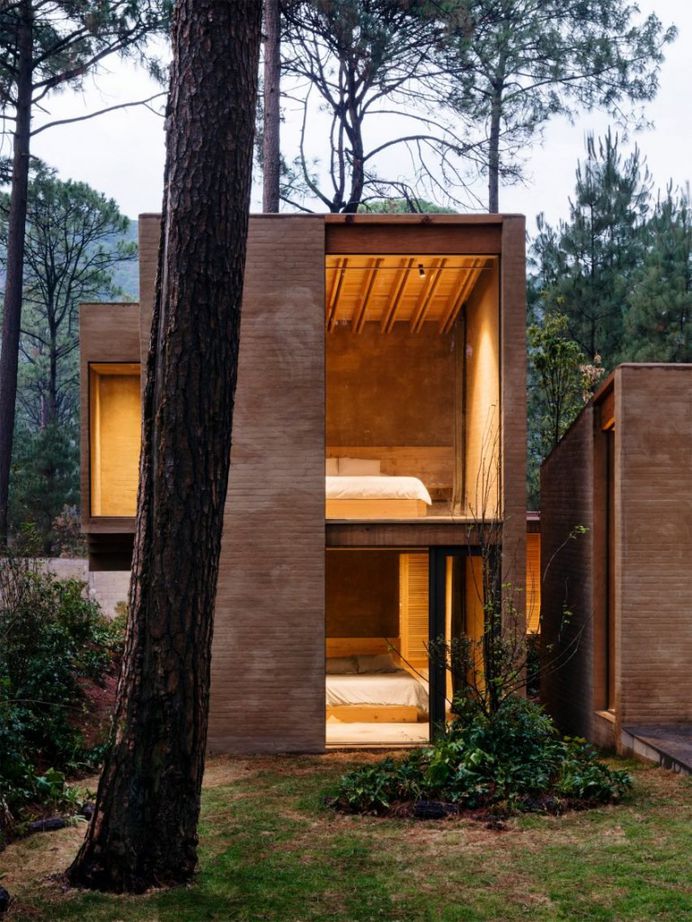 Soil-based render creates pink walls for houses by Taller Hector Barroso