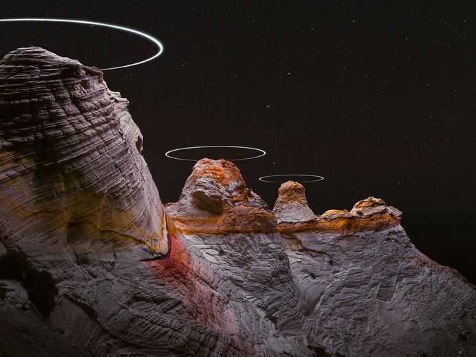 Long Exposure Photos Capture the Light Paths of Drones Above Mountainous Landscapes | Colossal