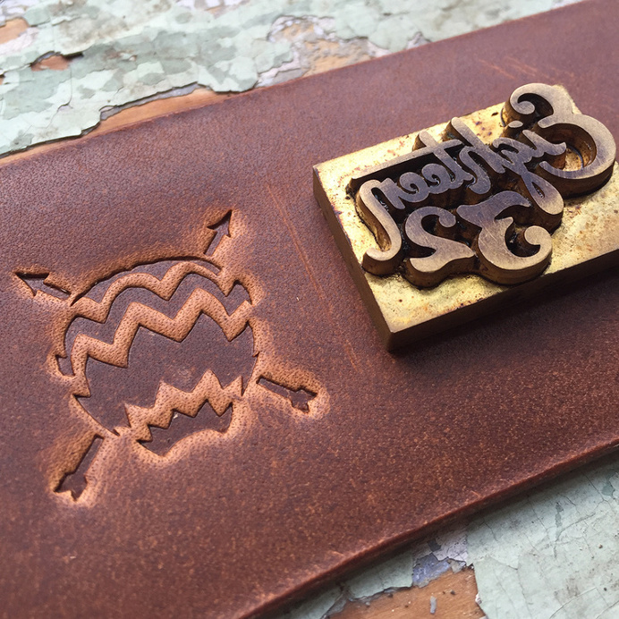 Custom Leather Coffee Sleeves for Vagabond Coffee Co. by Eighteen32. #coffee #logo #branding #leather