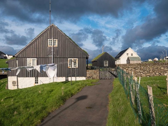 Evening lights in the village of Vidareidi, Faroe Islands.
