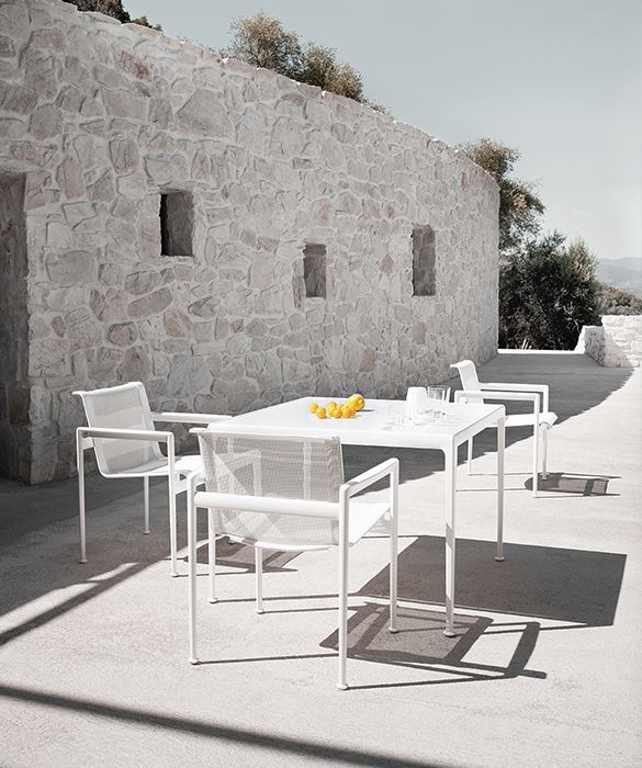 1966 outdoor dining table designed by Richard Schultz | twentytwentyone Seat in woven vinyl coated polyester mesh, aluminium frame with weather resistant polyester powder coat.