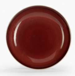 A fine copper red glazed porcelain plate #Sets #Teasets #Porcelainsets #Antiqueplates #Plates #Wallplates #Figures #Porcelainfigurines #porcelain