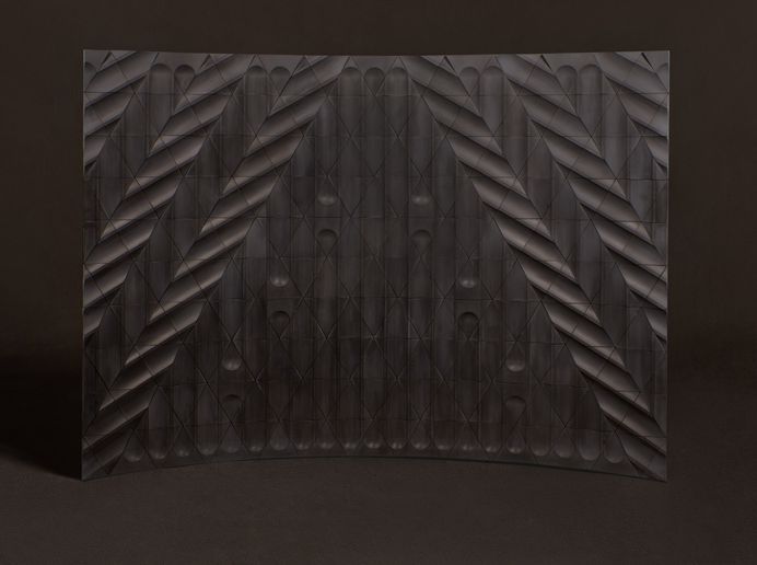 Flutes and Reeds is available in a variety of colors, and can be arranged into multiple alignments in the same section owing to each tile's triangular shape. (Courtesy Madhava Kalmar/Kaza Concrete)