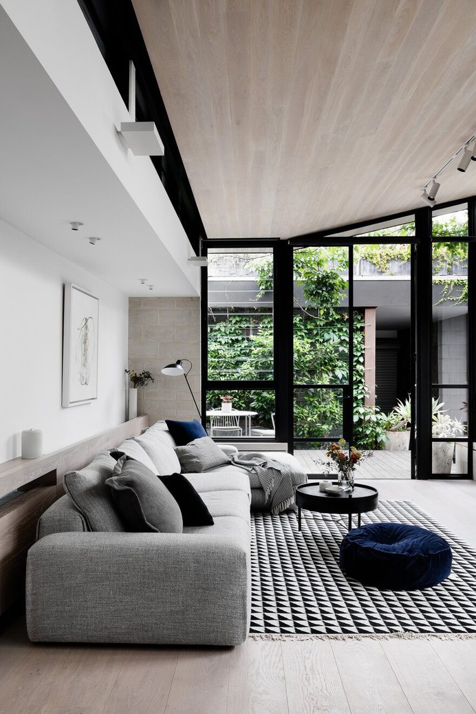 living room by Techne Architecture + Interior Design