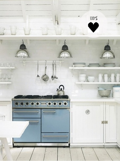 white kitchen with blue stove | the style files #interior #kitchen #white