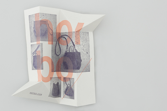 Logo and print with a distinctive folded angle detail designed by Blok for luxury bag, clothing and accessories brand Hoi Bo #grid