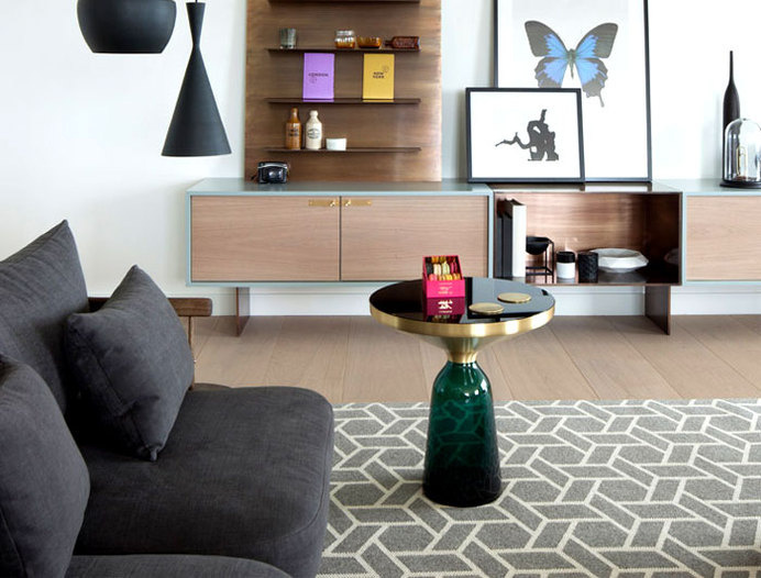 Luxury Penthouse Designed by Amos and Amos living area geometric rug flanked two sofas #interior #design #decor #home