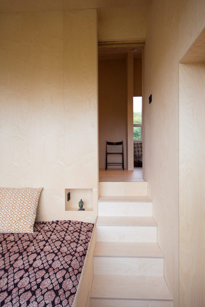 A Wooden Hillside Cabin by Kappland Arkitekter on the Island of Stokkøya, Norway