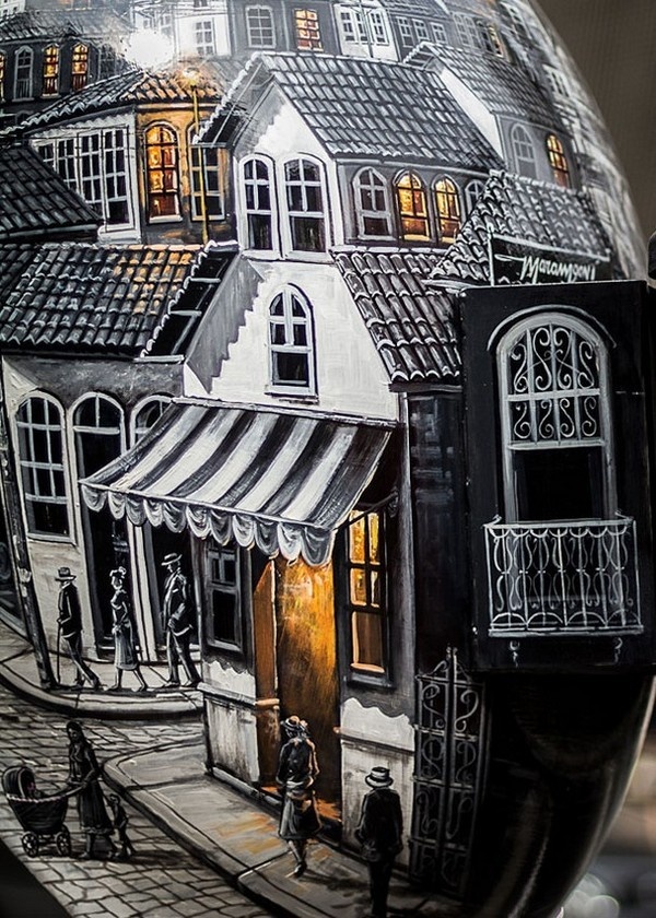 Close look of creative phone booth painted like small town inside #phone #public #booth #art #street #exterior #telephone