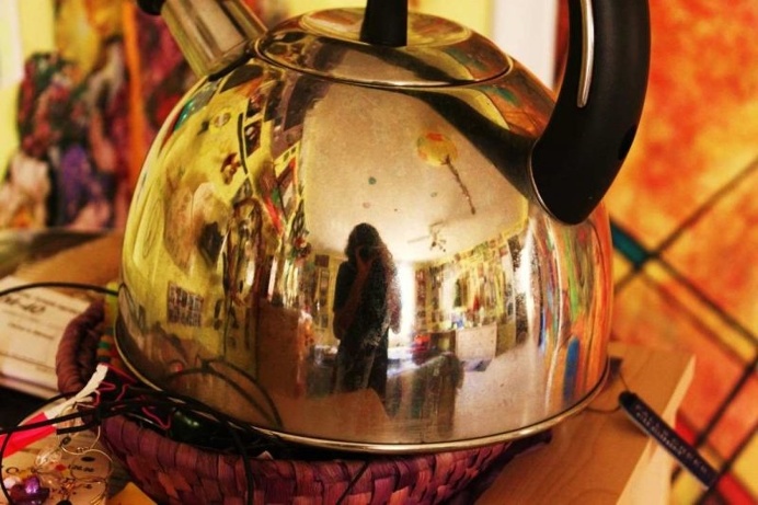 The Tea Kettle Adventures: Reflected Self-Portraits by Esha Biswas